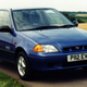 A blue Subaru Justy hatchback